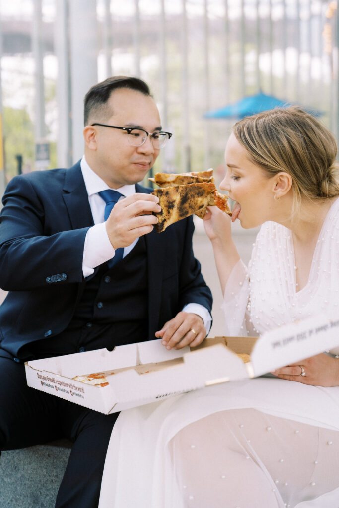 Bride and Groom eating pizza