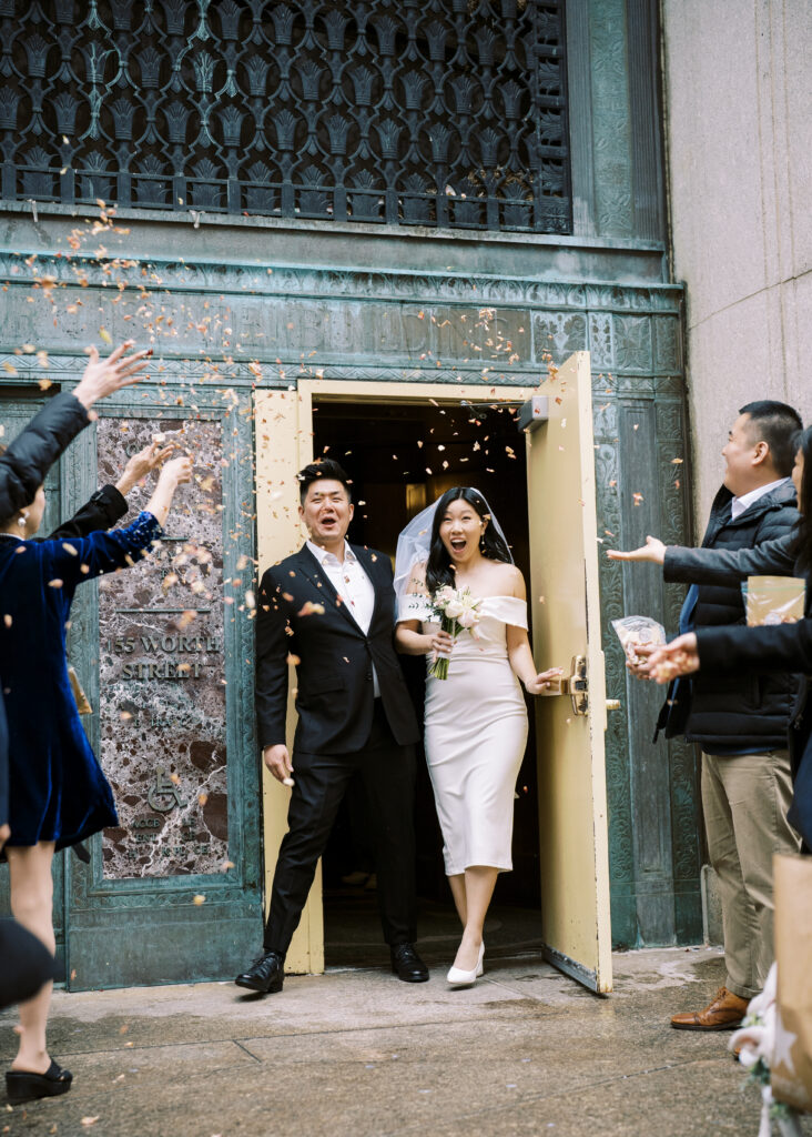 nyc city hall wedding exit with confetti