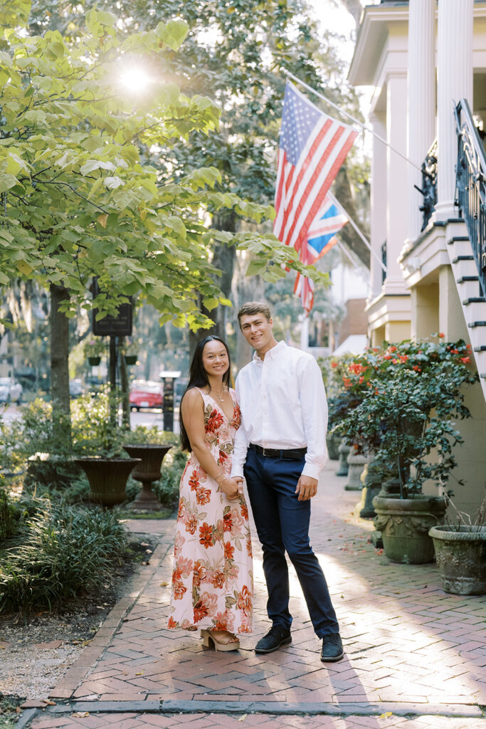 Couple posing for Historic Downtown Charleston Engagement Photos