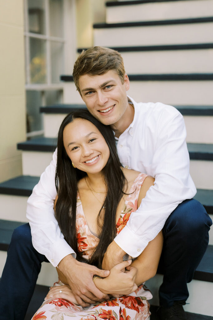 Couple sitting together in Forsyth Park 