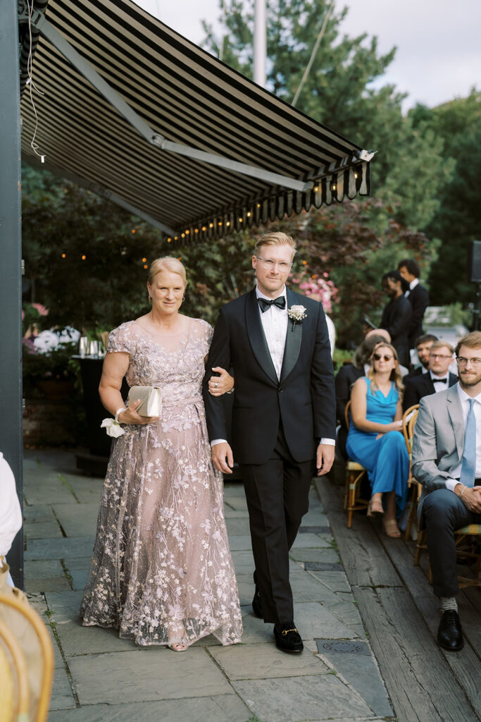 Groom walking down the aisle at the River Cafe