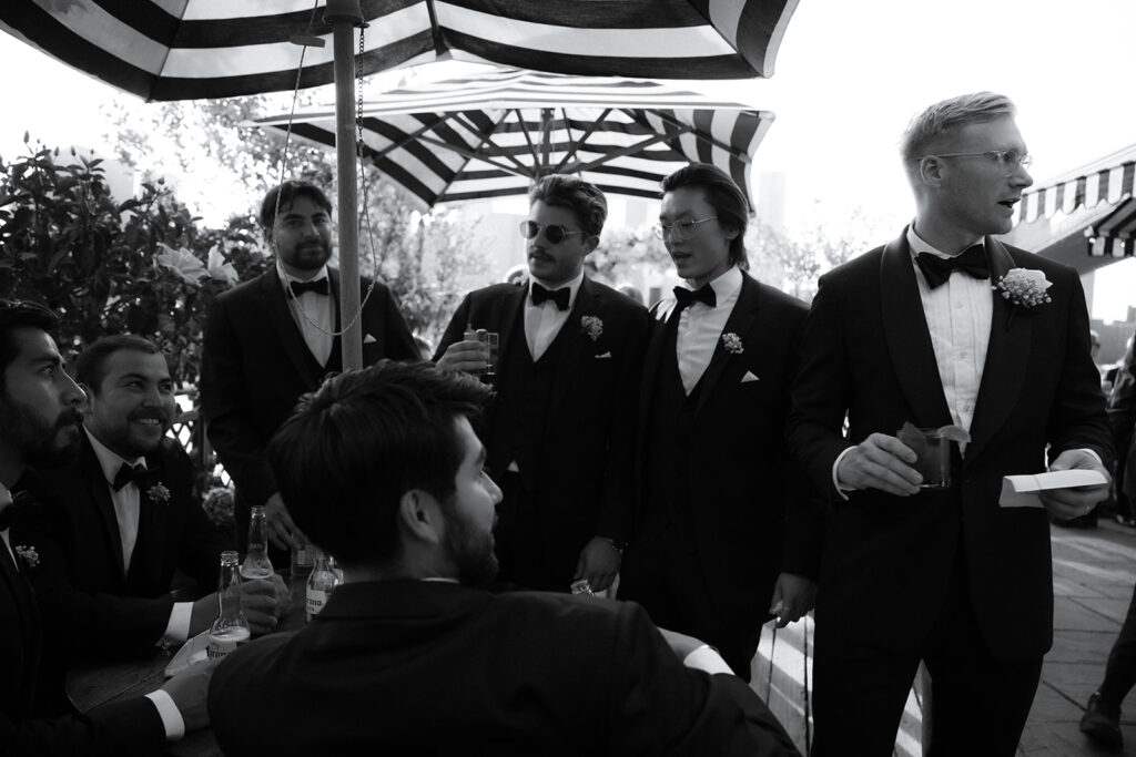 Groomsmen at cocktail hour at the River Cafe