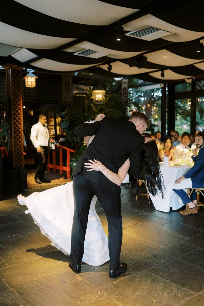 Bride and groom dancing at their reception at the River Cafe in Brooklyn